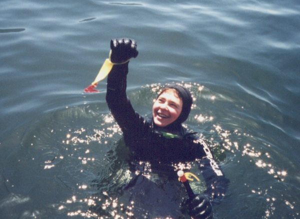 Marie holds depth tag